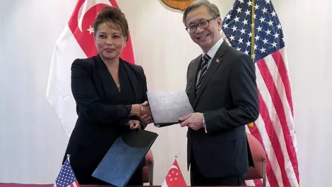 Sg and us sign doi 600x599