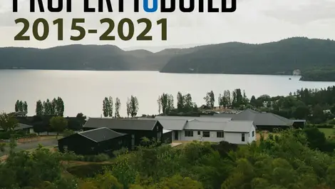 Which Auckland properties are dropping in value?