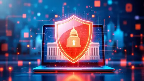 Shield symbol in front of computer and government building cyber protection public sector